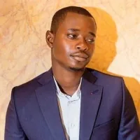 Professional headshot of Lade Ibraheem used in portfolio testimonial section